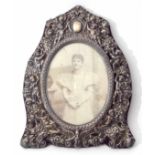 Late Victorian silver mounted photograph frame, the screw attached mount of pierced form profusely