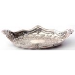 Victorian table basket of shaped oval form, embossed throughout with foliate details and with