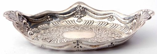 Victorian table basket of shaped oval form, embossed throughout with foliate details and with
