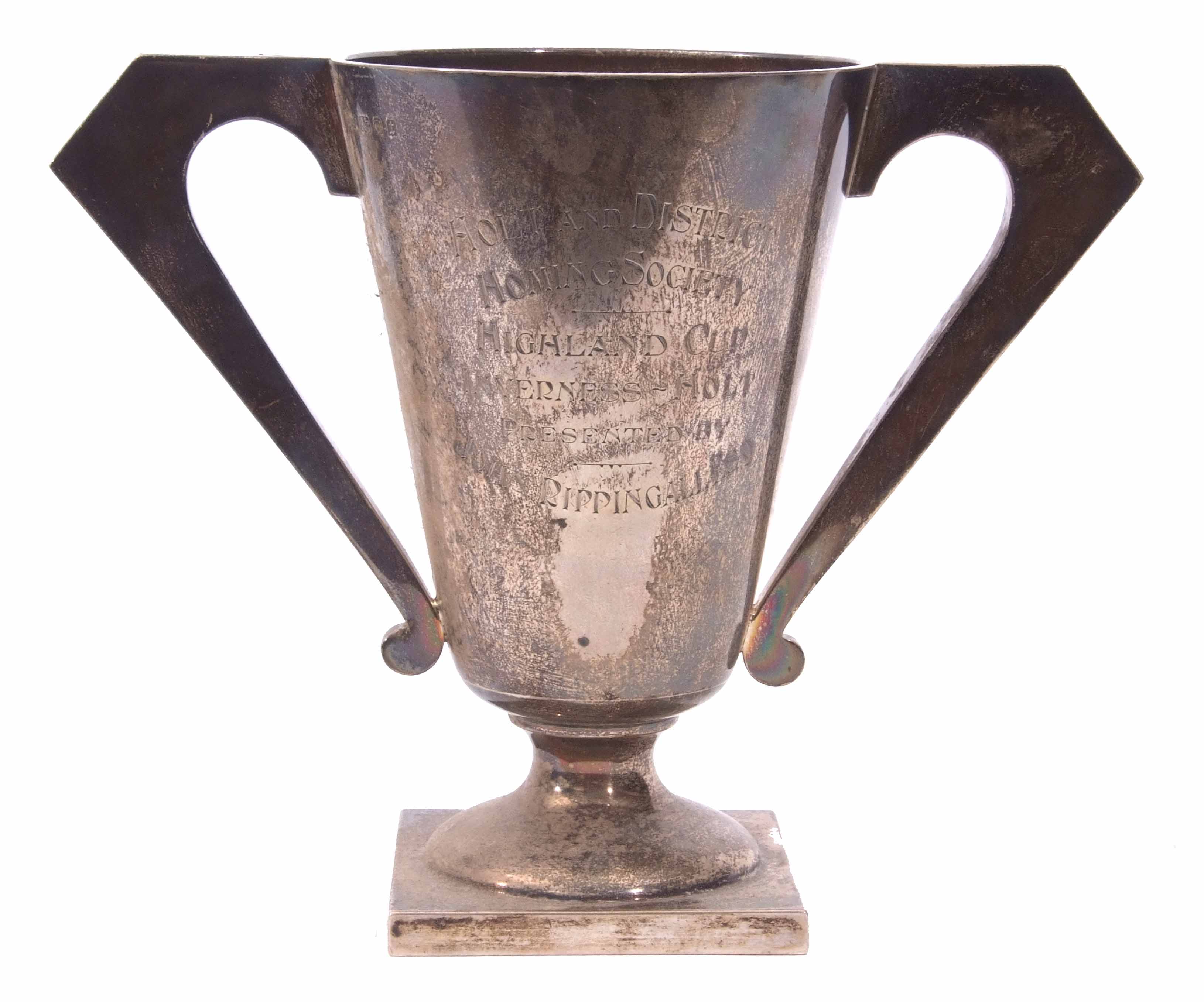 George V presentation engraved two handled trophy cup, in the Art Deco manner, with hollow cast