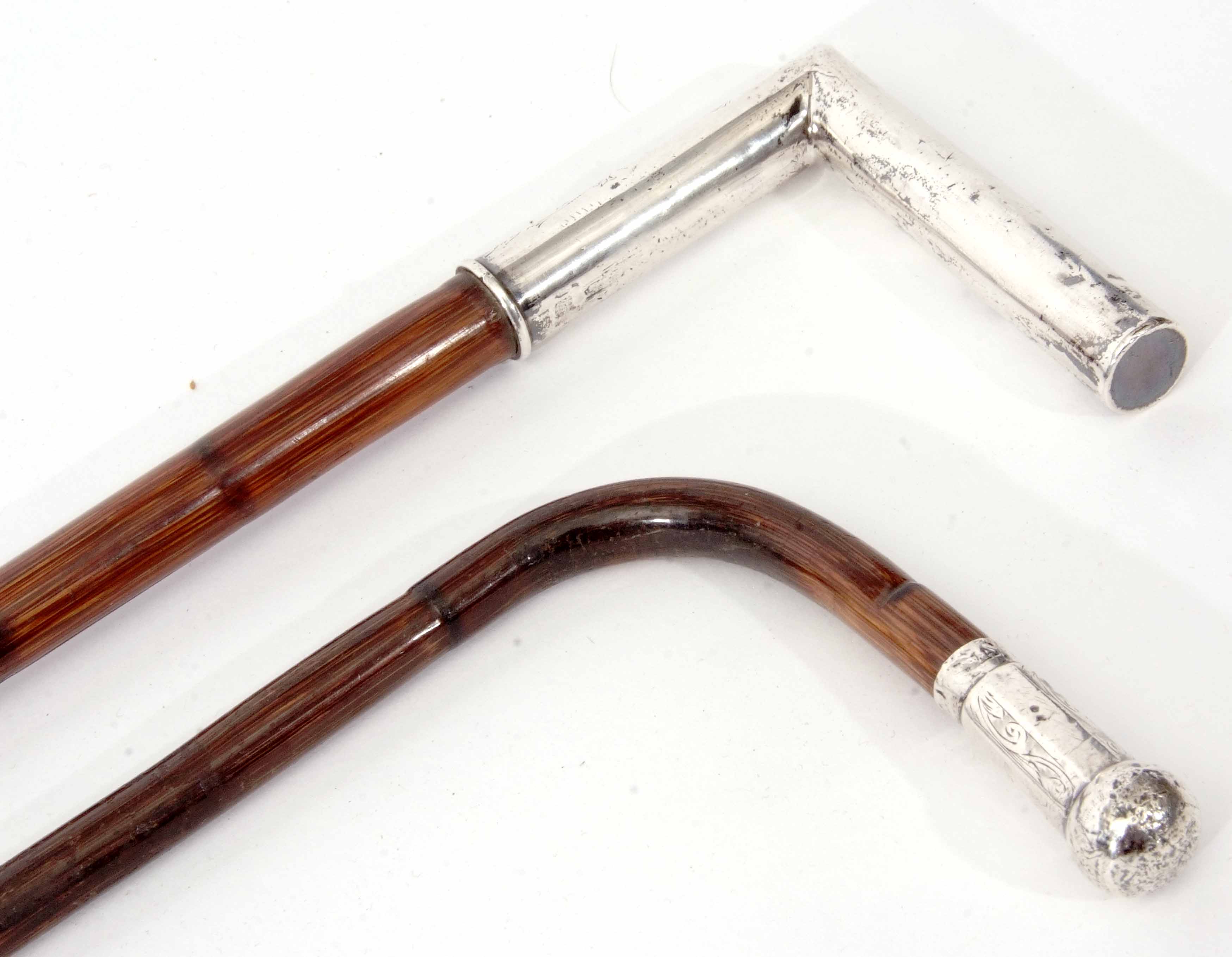 Mixed Lot: comprising two various silver mounted walking sticks, each with applied handles and - Image 2 of 3