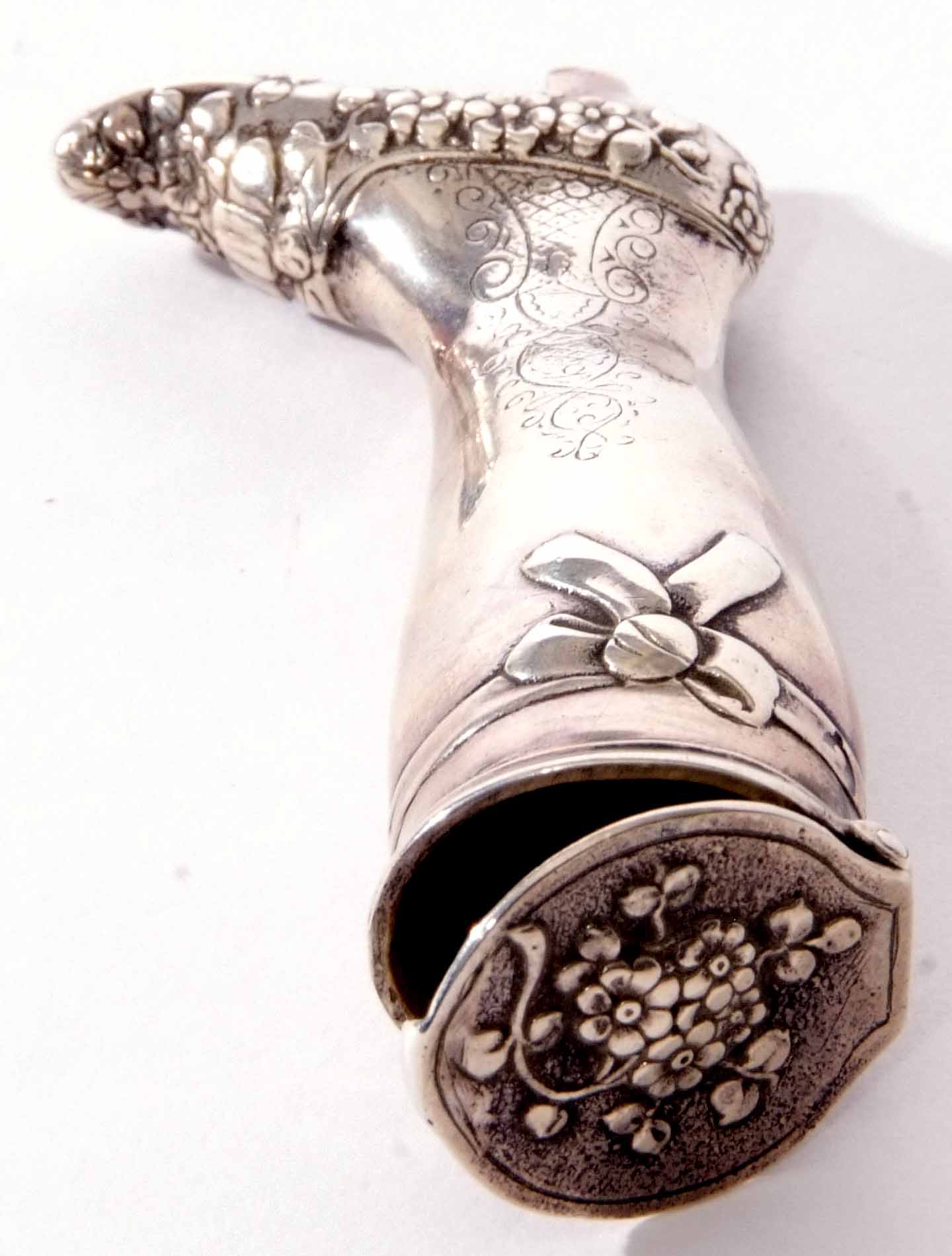 Continental white metal pill canister modelled in the form of a lady's right leg with floral - Image 2 of 3