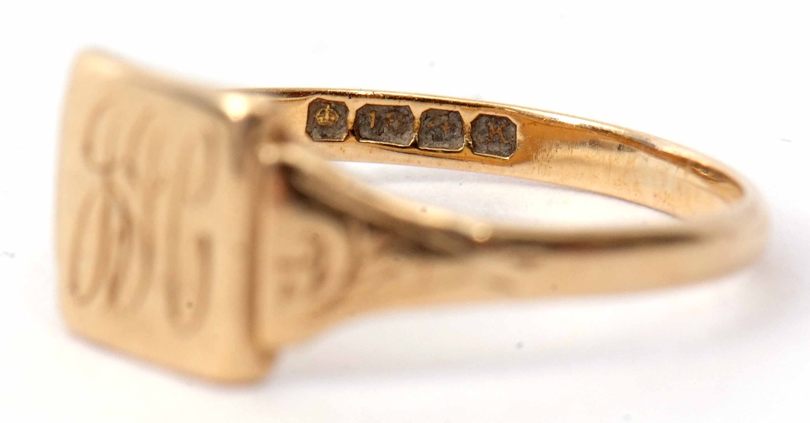 An 18ct gold signet ring, the square panel engraved with initials, hallmarked Birmingham 1934, 1.