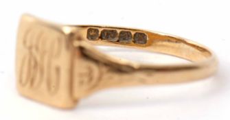 An 18ct gold signet ring, the square panel engraved with initials, hallmarked Birmingham 1934, 1.