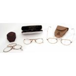 Mixed Lot: comprising a pair of gilt framed folding spectacles in a simulated shagreen case (clasp