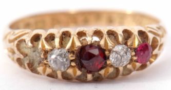 Edwardian 18ct gold diamond and ruby ring, alternate set with two old cut diamonds and two of