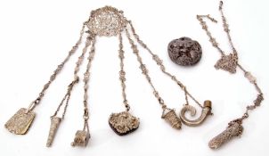 Late 19th/early 20th century base metal chatelaine, the cast mount with hinged clasp, stamped "