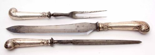 George V silver handled three piece carving set comprising safety fork, carving knife and steel,