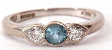 Aquamarine and diamond three stone ring, the central aquamarine flanked by two brilliant cut