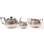 Late 19th century electro plated Britannia metal three piece tea set comprising tea pot, sugar basin