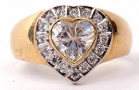 A 585 stamped paste set dress ring, a heart shaped design to a plain polished mount, gross weight