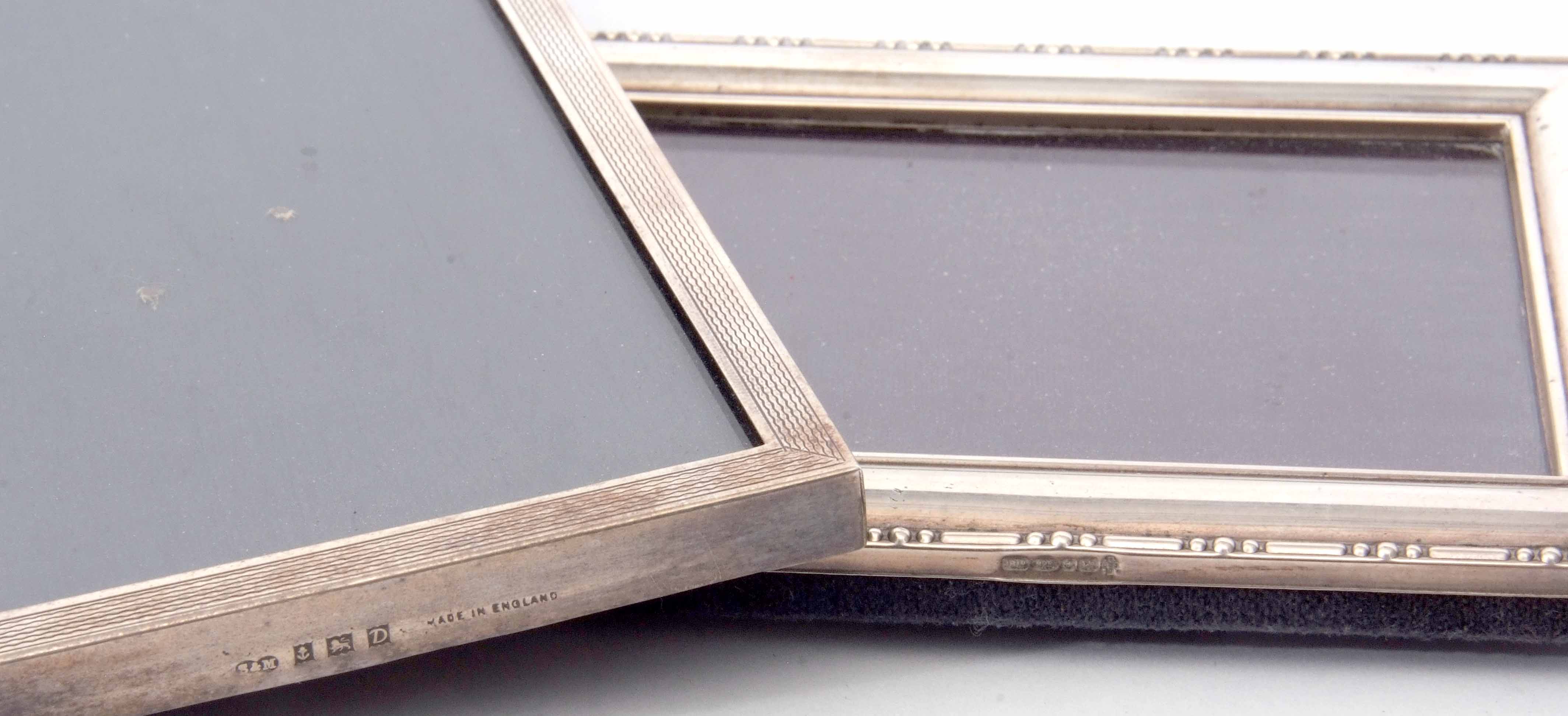 Mixed Lot: comprising two various silver mounted easel backed photograph frames, the first of engine - Image 2 of 2