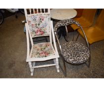 WHITE PAINTED ROCKING CHAIR WITH FLORAL UPHOLSTERED SEAT AND BACK TOGETHER WITH A FURTHER LEOPARD