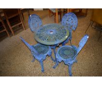 BLUE PAINTED CAST ALUMINIUM CIRCULAR PIERCED TOP GARDEN TABLE AND SET OF FOUR MATCHING CHAIRS