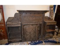 19TH CENTURY GOTHIC OAK STYLE SIDEBOARD, THE TOP WITH CARVED PANEL WITH OPEN SHELVES, THE BASE