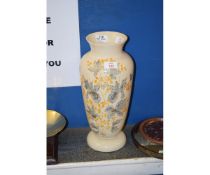 YELLOW GLASS VASE WITH A PAINTED DESIGN OF AUTUMN FLOWERS IN BLUE, GILT AND YELLOW, 40CM HIGH