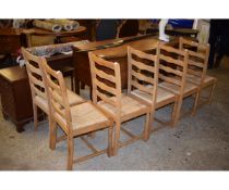 SET OF SIX BEECHWOOD LADDER BACK RATTAN SEATED DINING CHAIRS