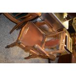 BEECHWOOD FRAMED BROWN REXINE UPHOLSTERED RECLINER ARMCHAIR, OR BARBER’S TYPE CHAIR, WITH TURNED