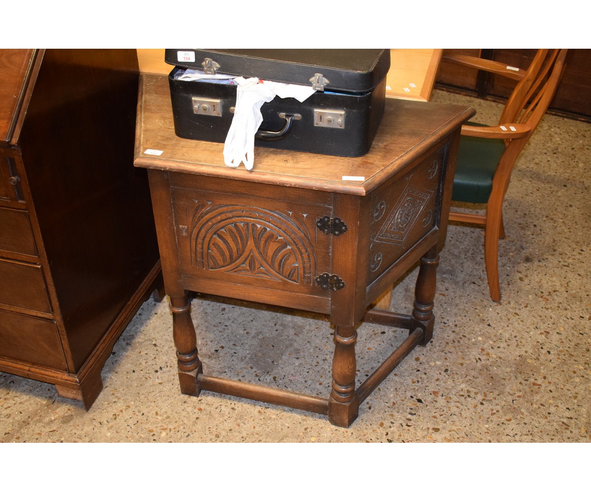 MID-20TH CENTURY OAK FRAMED SMALL PROPORTION SIDEBOARD WITH CANTED CORNERS WITH SINGLE DOOR WITH