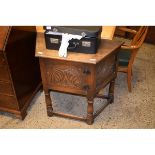 MID-20TH CENTURY OAK FRAMED SMALL PROPORTION SIDEBOARD WITH CANTED CORNERS WITH SINGLE DOOR WITH