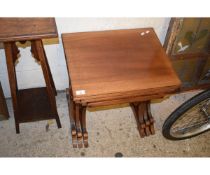 MAHOGANY NEST OF THREE TABLES WITH SHAPED ENDS