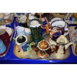 TRAY OF NOVELTY TEA POTS TO INCLUDE A BARGEE TYPE TEA POT, CHARACTER JUG ETC