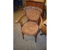 EARLY 20TH CENTURY OAK FRAMED ARMCHAIR WITH CANE SEAT AND BACK