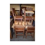 SET OF SIX RUSTIC ARTS & CRAFTS TYPE DINING CHAIRS WITH OAK FRAMES AND TAN LEATHER SEAT AND BACK