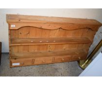 PINE FRAMED WALL MOUNTED PLATE RACK WITH TWO FIXED SHELVES AND FOUR DRAWERS WITH KNOB HANDLES