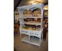GOOD QUALITY GREEN AND CREAM PAINTED DRESSER WITH TWO OPEN SHELVES, THE BASE WITH TWO DRAWERS WITH