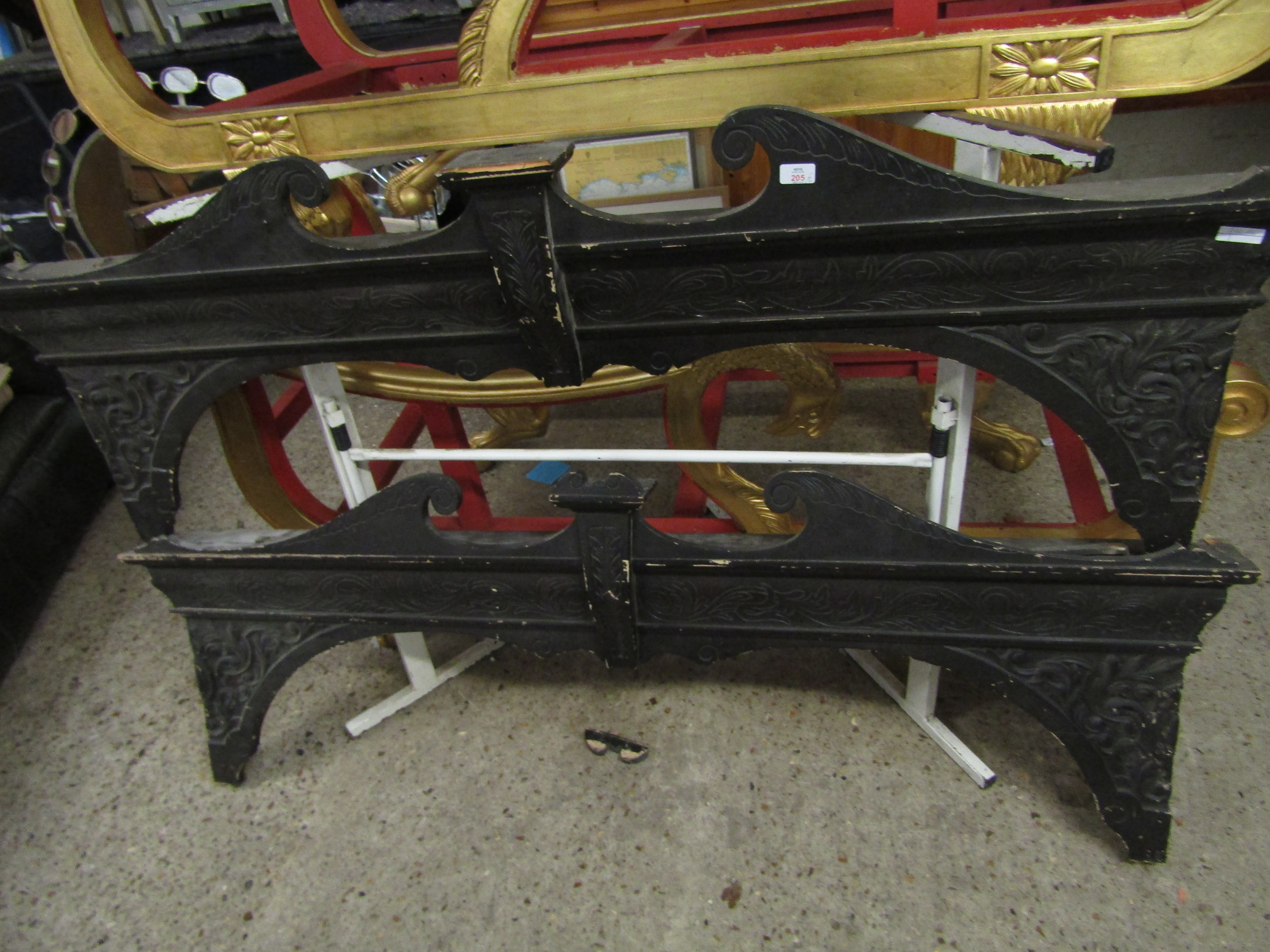 TWO PAINTED AND CARVED PELMETS WITH SWAN NECK PEDIMENT