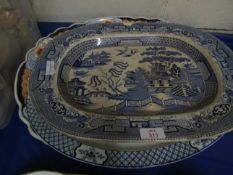 WILLOW PATTERN LARGE MEAT DISH TOGETHER WITH A FURTHER MEAT DISH AND ONE OTHER