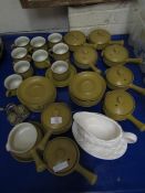 DENBY YELLOW GLAZED CUPS AND SAUCERS TOGETHER WITH SOUP BOWLS ETC