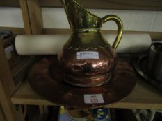 COPPER AND BRASS JUG TOGETHER WITH A FURTHER TRAY