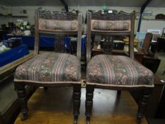 PAIR OF AMERICAN WALNUT CARVED SPLAT BACK DINING CHAIRS WITH STRIPED UPHOLSTERED SEATS AND TURNED