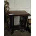 EDWARDIAN MAHOGANY AND SATINWOOD BANDED NEST OF THREE TABLES