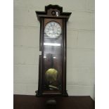 WALNUT AND EBONISED WALL CLOCK WITH ENAMEL ARABIC CHAPTER RING