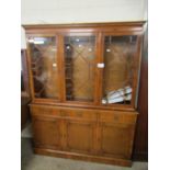 YEW WOOD BOOKCASE WITH TWO ASTRAGAL GLAZED DOORS TO TOP, BASE FITTED WITH THREE DRAWERS OVER THREE