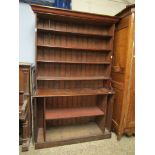 PINE FRAMED BOOK CASE WITH FOUR OPEN SHELVED TOP AND PANEL BACK AND SECTIONAL BASE