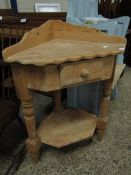 WAXED PINE CORNER STAND FITTED WITH SINGLE DRAWER WITH OPEN SHELF