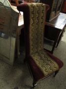 19TH CENTURY MAHOGANY PRIE DIEU CHAIR WITH MAHOGANY TURNED LEGS AND RAISED ON BRASS CASTERS