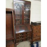 20TH CENTURY MAHOGANY BUREAU BOOKCASE WITH TWO ASTRAGAL GLAZED DOORS AND DROP FRONT FITTED WITH