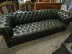 EXTREMELY LARGE GREEN LEATHER CHESTERFIELD RAISED ON BUN FEET