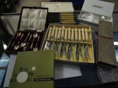 SEVEN BOXED CONTAINING MIXED CAKE SLICES, CAKE FORKS, STAINLESS STEEL WARES AND A SET OF SIX