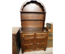 EARLY 20TH CENTURY DRESSER WITH ARCHED TOP WITH TWO FIXED SHELVES, THE BASE WITH TWO DRAWERS OVER