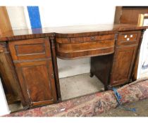 REGENCY MAHOGANY SIDEBOARD FITTED CENTRALLY WITH A DRAWER FLANKED EITHER SIDE BY CUPBOARD DOORS WITH