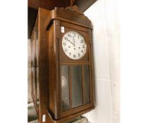 OAK FRAMED WALL MOUNTED DROP DIAL CLOCK WITH SILVERED DIAL