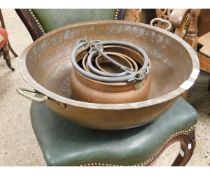 EASTERN LARGE COPPER PAN WITH BRASS HANDLES TOGETHER WITH A SET OF FOUR COPPER PANS WITH CAST