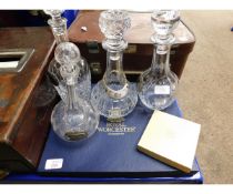 FOUR CUT GLASS DECANTERS, SILVER PLATED LABELS, A WORCESTER BREAD PLATE ETC