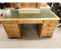 PINE FRAMED TWIN PEDESTAL DESK WITH NINE DRAWERS WITH TURNED KNOB HANDLES WITH GREEN LEATHER INSERTS